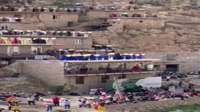 حلقة ذكر صوفية كردية في مدينة كرمان‌شاه، إيران.