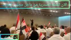 نواب الكتلة الصدرية يرتدون الاكفان و اصوات الصلاة التعجيلية تملئ قبة البرلمان